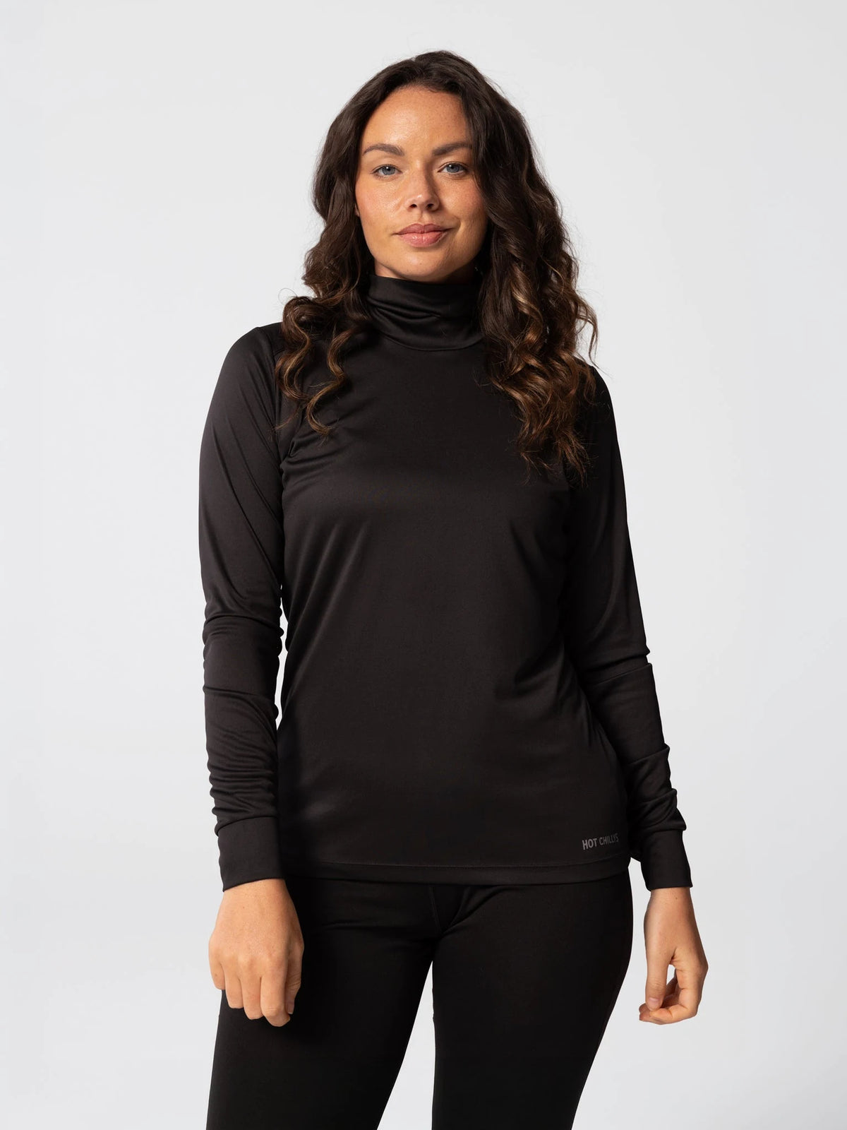 Hot Chillys Womens Peach Skins Solid T-Neck in Black, front view on model