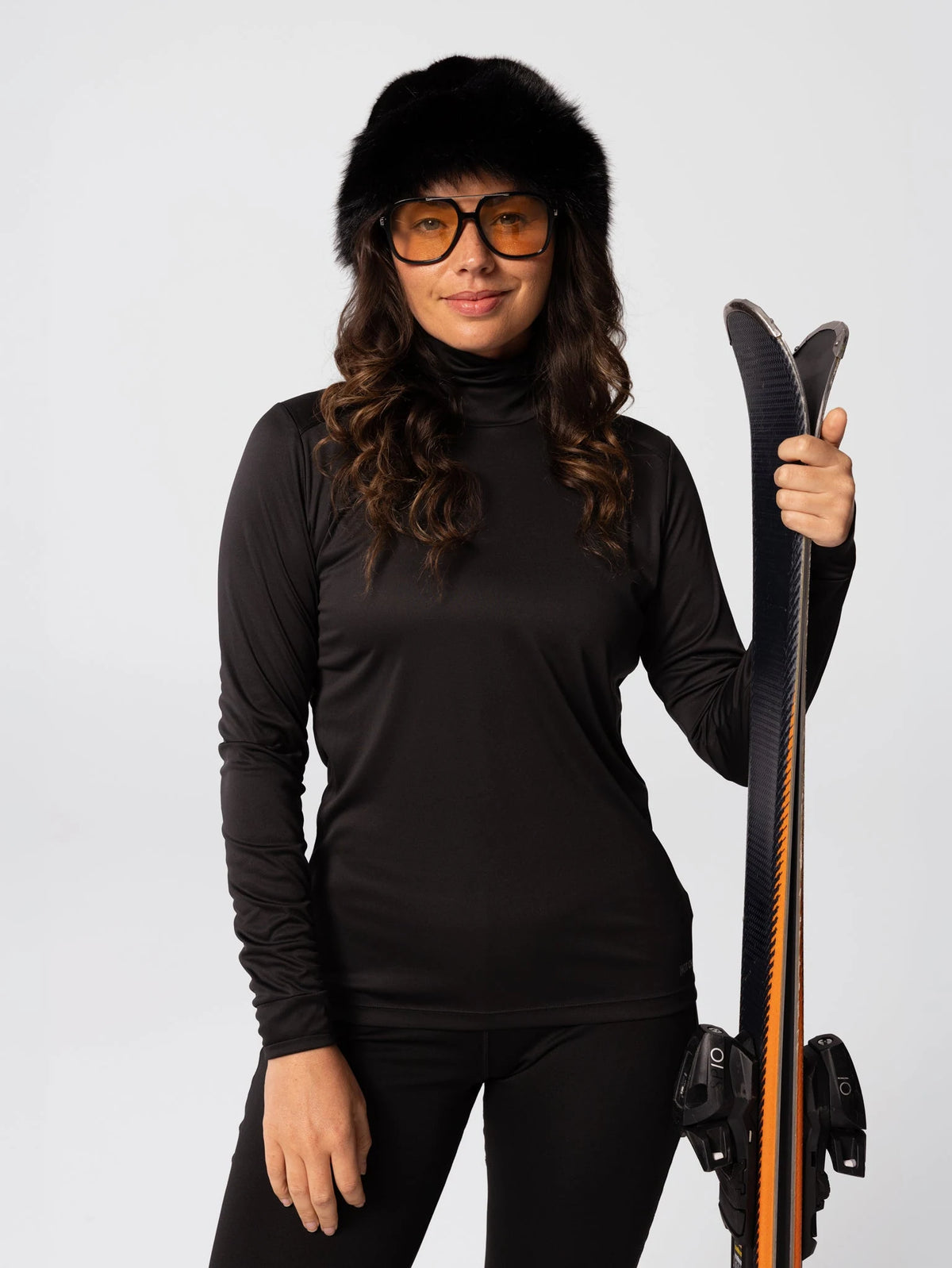 Hot Chillys Womens Peach Skins Solid T-Neck in Black, front view on model