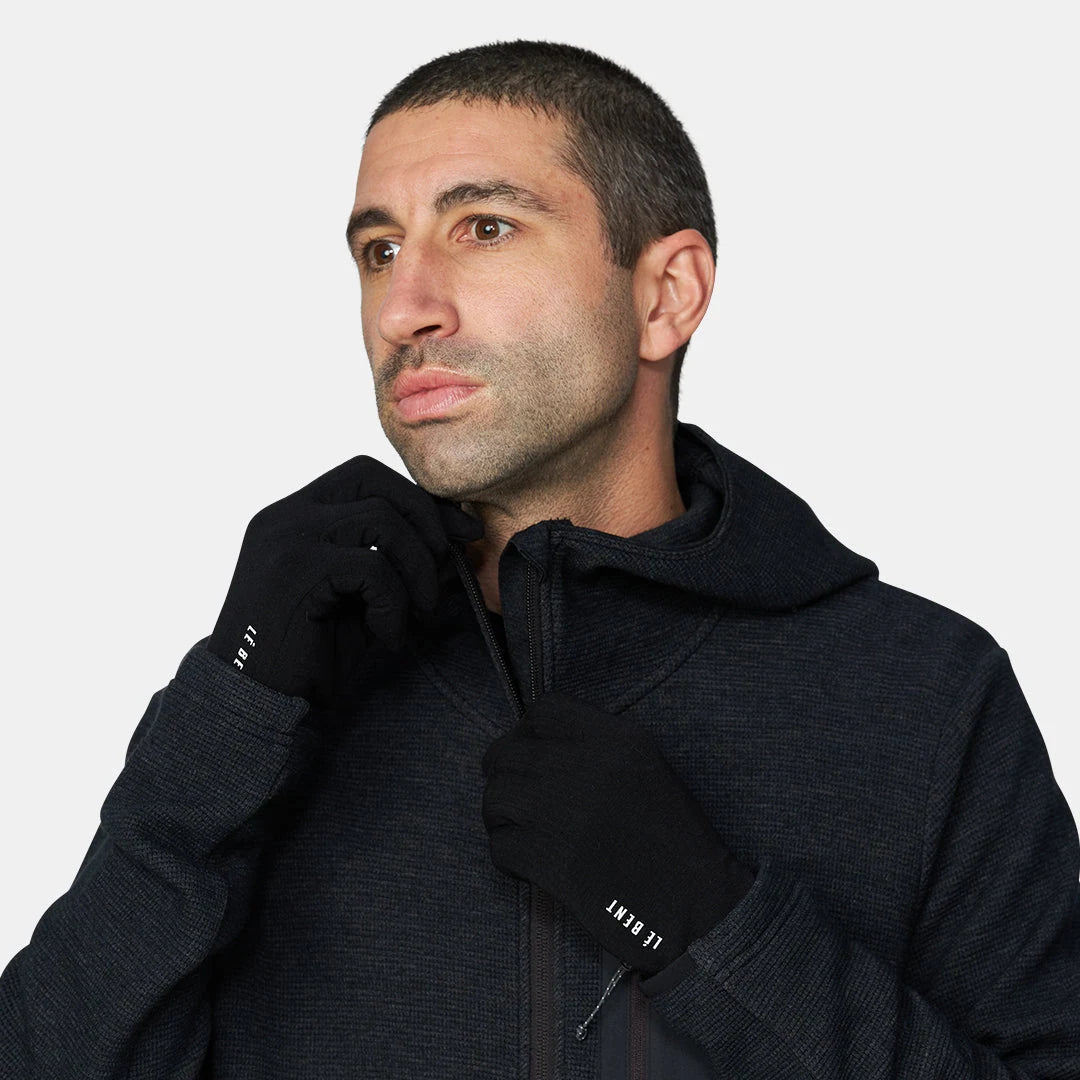 Le Bent Heavyweight Antarctic Grid Fleece Glove Liner in Black, Worn side view