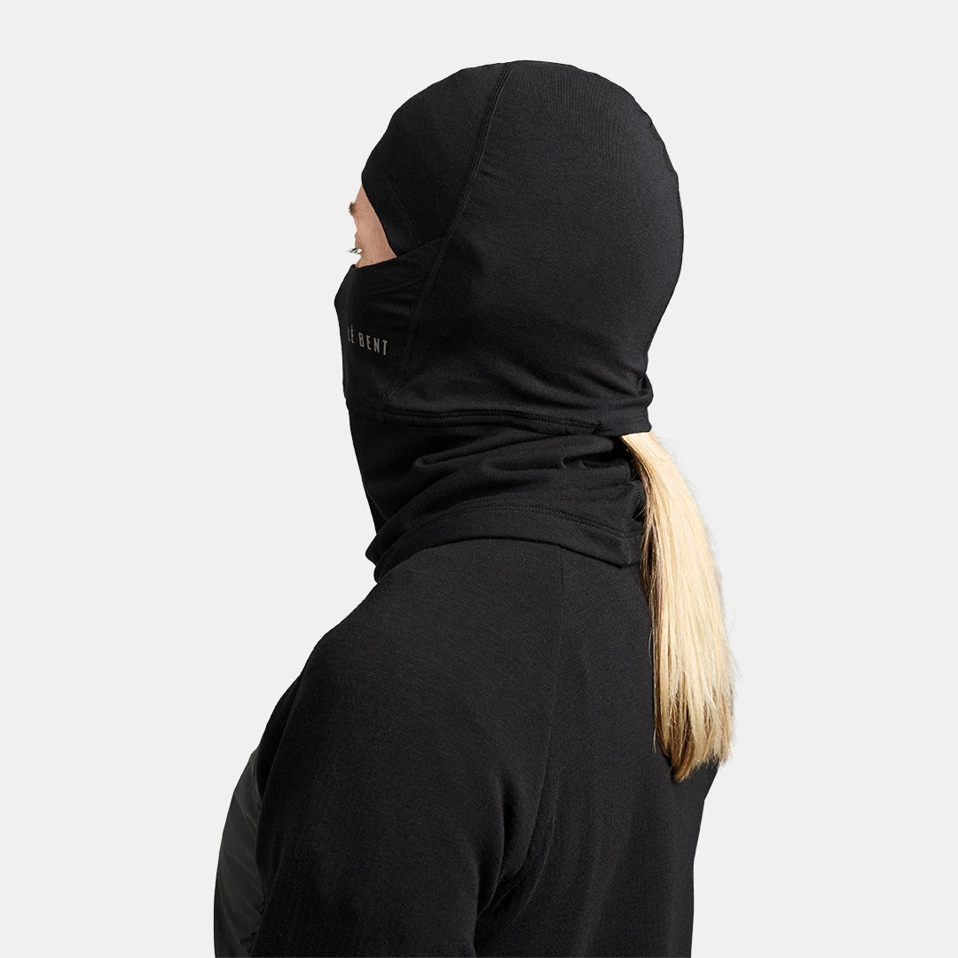 Le Bent Double Up Midweight Balaclava in Black, side view on model