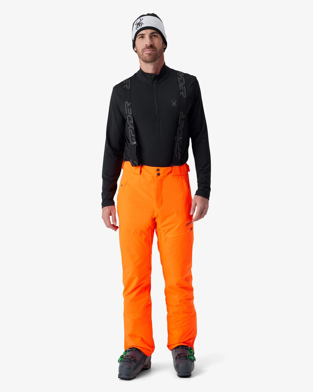 Spyder Dare Pants in Fusion Orange, front view on model