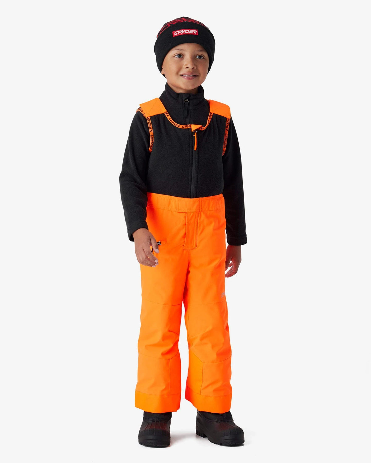 Spyder Toddler Expedition Pants in Fusion Orange, front view on model