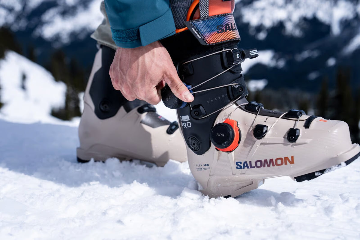 Sno-Haus boot fitter working on a customer's ski boot on the shop floor